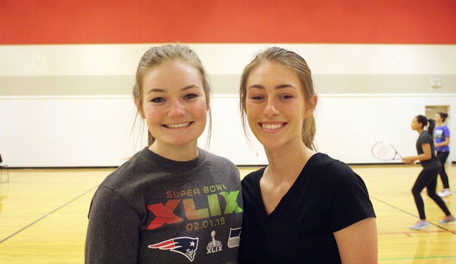 Evan Pappas/Staff PhotoSeniors Stephanie Miles and Ashley Cole practice with their team indoors during a rainy afternoon.