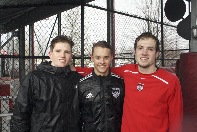 Evan Pappas/Staff PhotoFrom left: Soccer Captains Reid Howland