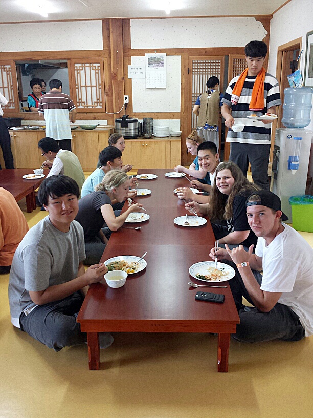 Courtesy PhotoAmerican and Korean students eat dinner at a Buddhist temple in Gangjin on a recent Snoqualmie Sister Cities Association exchange trip. Now