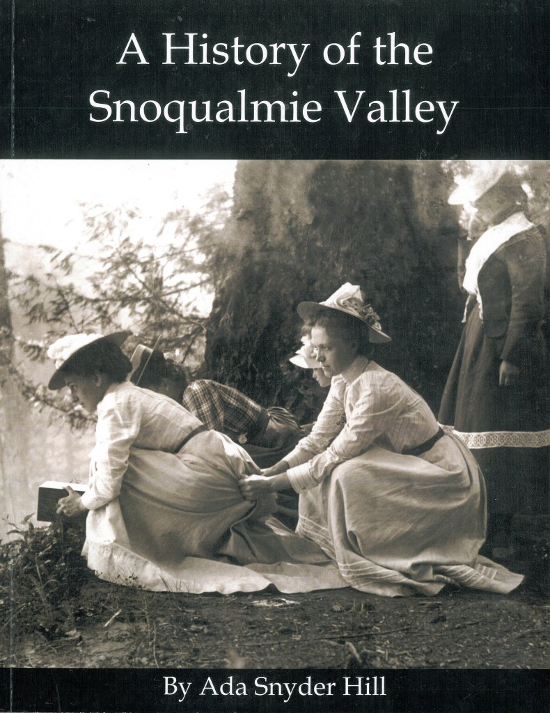 Courtesy PhotoThe 2016 cover of “A History of the Snoqualmie Valley” features this historic photo of a woman holding onto another’s skirts as she looks over Snoqualmie Falls.