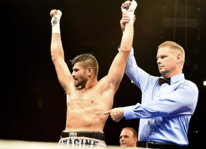 The referee raises Mike Gavronski’s hands in victory in Saturday’s boxing match at the Emerald Queen Casino in Tacoma. Photo courtesy of James Gibowski