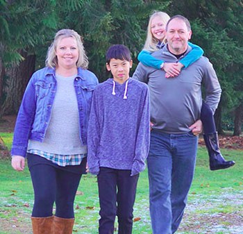 Courtesy PhotoJohn Bomar is pictured with his family