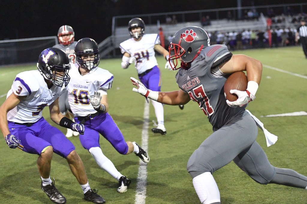 Jack Weidenbach ran the ball for a total of 33 yards in Mount Si’s game Friday night against Issaquah.Photo courtesy of Calder Productions