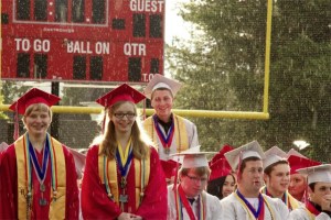 Honors students Landon and Riley Edwards and Kyle Seymour (standing