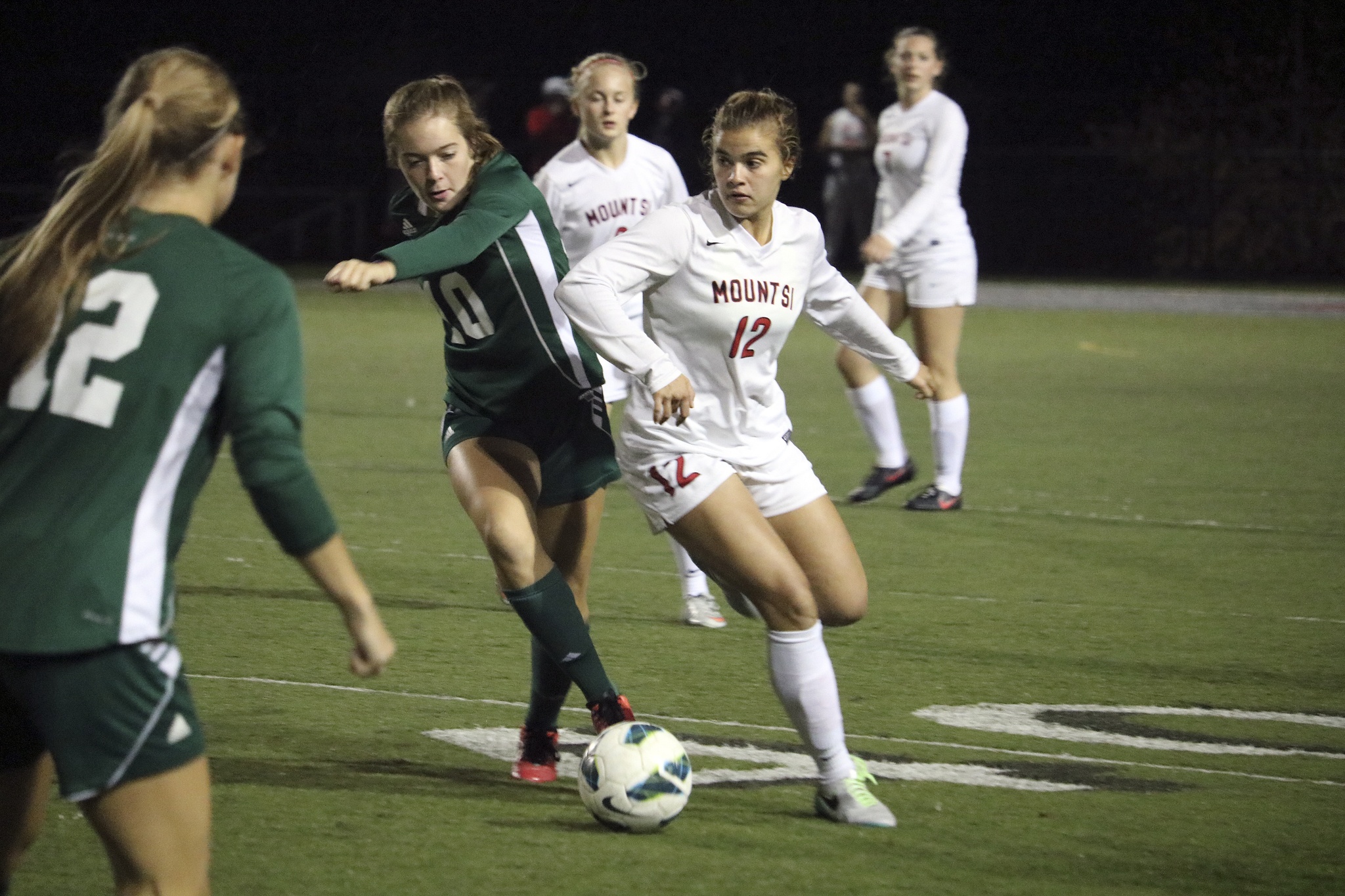 Evan Pappas/Staff PhotoMount Si Captain Natalie Weidenbach challenges a Skyline player for possession in the first half.