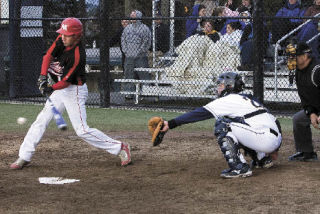 Mount Si’s Frank Tassara swings at a pitch during a key at-bat last Friday
