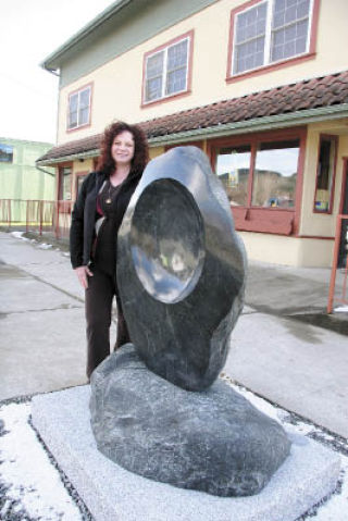 Visiting the latest sculpture put in place along in the downtown district