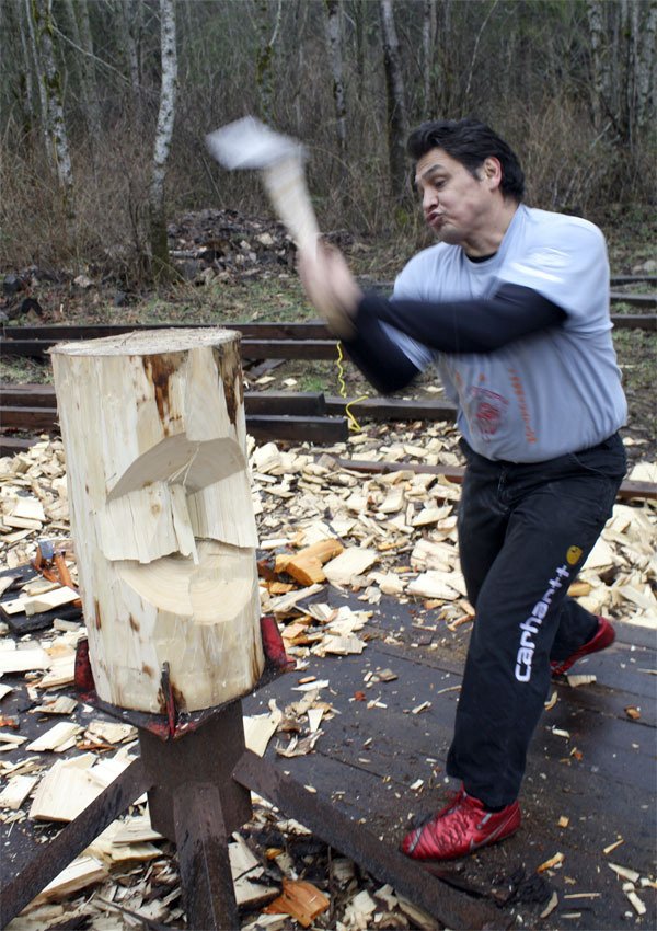 Snoqualmie's David Moses swiftly chops a cottonwood log