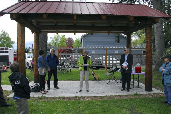Before officially cutting the ribbon on the covered stage at Olive Quigley Park