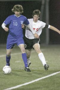 The Wildcats Ben Joselyn pushes his way around a Liberty defender in last weeks 1-0 win over the Patriots. The game went into overtime during which Doug Silvius scored the lone goal.