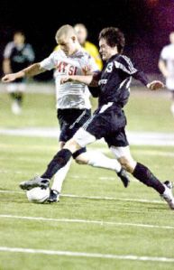 Jeff Chapman battles with a Sammamish defender in last weeks 0-0 overtime tie. It was their fourth straight overtime contest.