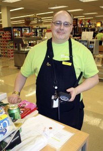 Ready to help customers at the self-check-out aisle
