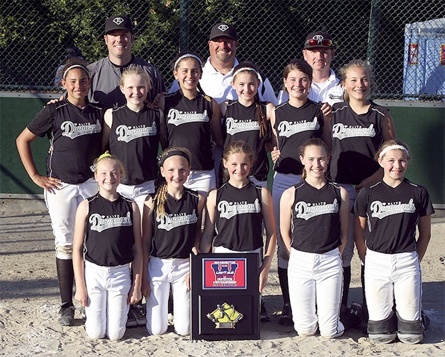 The Elite Diamonds 12 and under fastpitch softball team includes