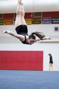 Jenn Rogers warms up for a meet in 2014.