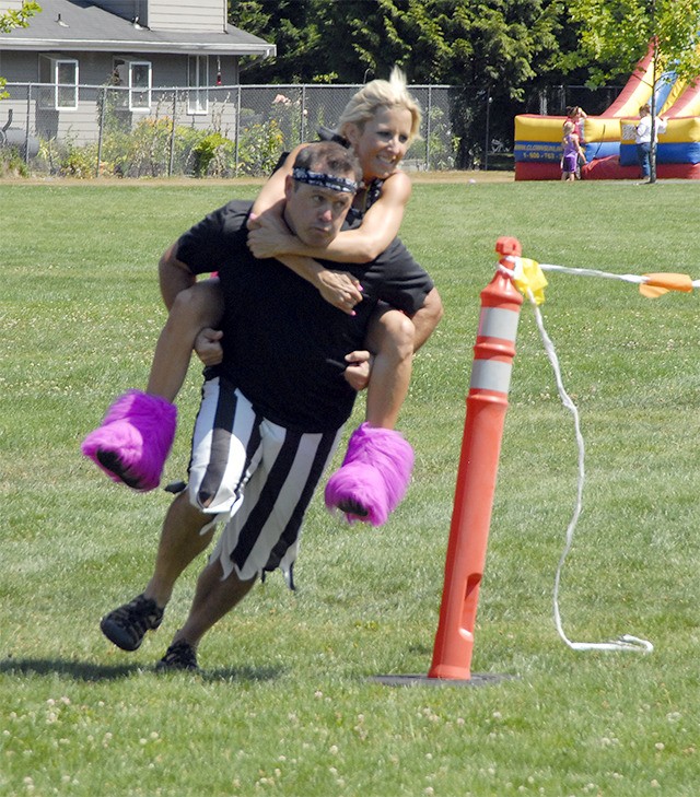 Greg and Carlye Lowell of North Bend donned costumes and raced for glory