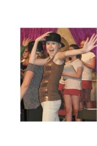 Chief Kanim student Shannon McEldowney strikes a pose during a recent rehearsal of “High School Musical.” Show director Laurie Hancock said the school’s adaptation of the popular Disney film is upbeat “with very few down moments.”