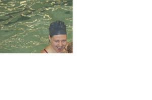 Laurel Anderson cheers on Haven Beares as he swims through hoops at the Si View Community Center pool. The 4-year-old’s mother