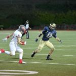 Garrett Stiller faces off against an Everett player in the second half. (Courtesy of Calder Productions)