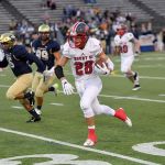 Max Bonda rushes through Everett&rsquo;s players in the first half. (Courtesy of Calder Productions)