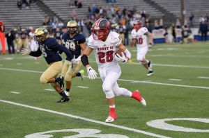 Max Bonda rushes through Everett&rsquo;s players in the first half. (Courtesy of Calder Productions)
