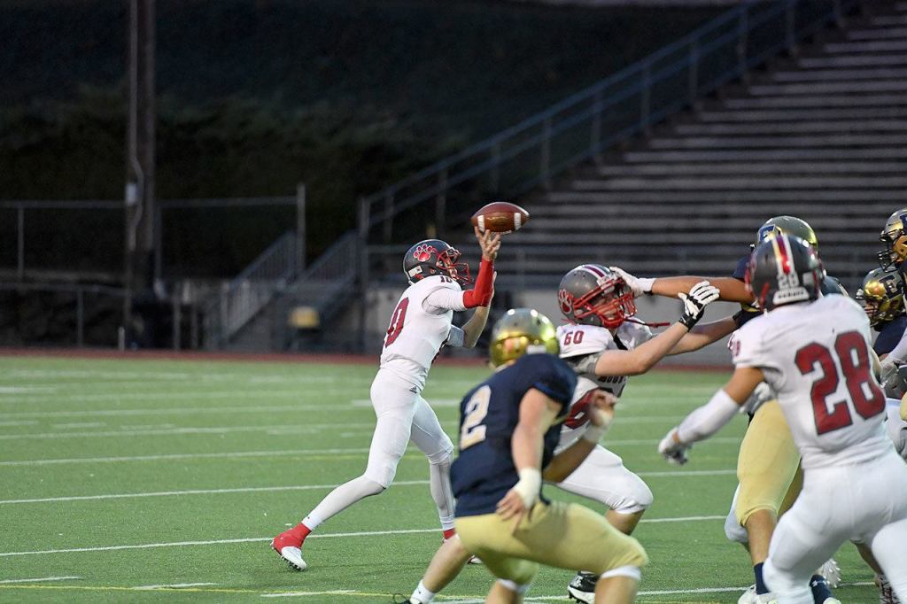 Quarterback Cale Millen goes for a pass. (Courtesy of Calder Productions)