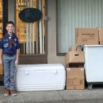 Cub Scouts Calen Munoz and Robby Shogren smile as they deliver more than 200 pounds of food donations to the Mount Si Food Bank.                                Courtesy Photo