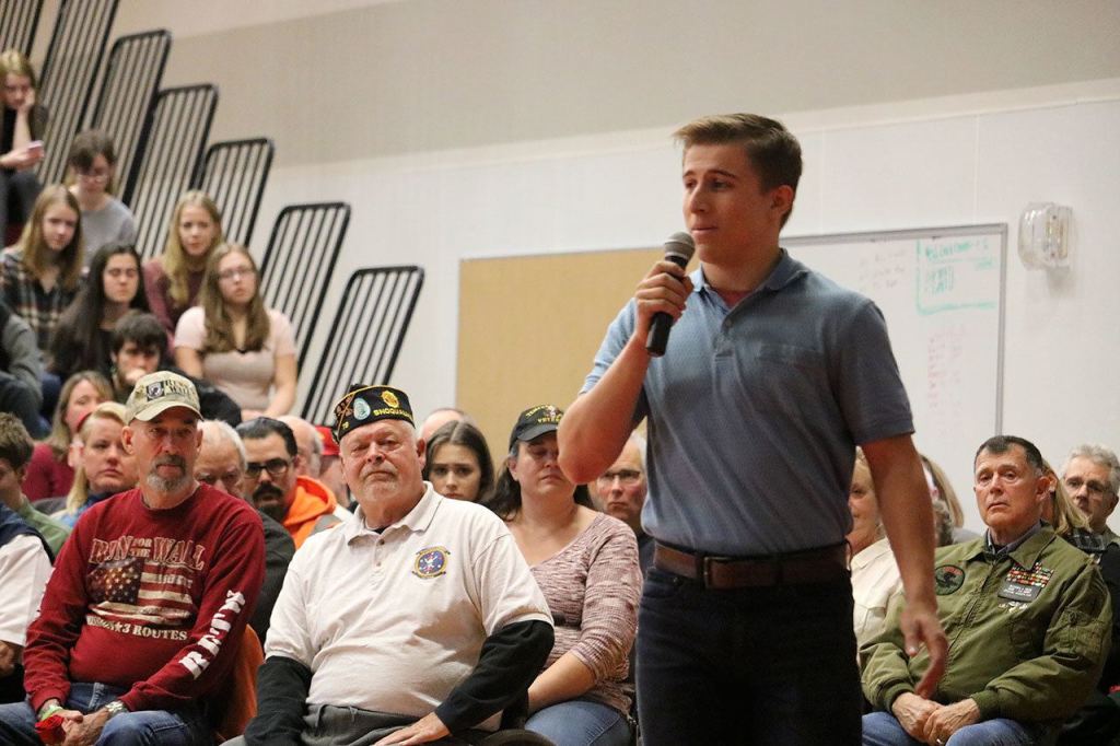 Senior Austin Ross delivers a moving speech at the Mount Si High School assembly about his experience growing up with a father in the military. (Evan Pappas/Staff Photo)