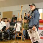 Michael Reagan shared the story of how the Fallen Heroes Project began and how donations from the Snoqualmie Valley School District help fund the project. (Evan Pappas/Staff Photo)