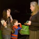 A North Bend family talks with Heidi Dukich during the Snoqualmie Valley Food Bank&rsquo;s open house Thursday, Nov. 10.                                Carol Ladwig/Staff Photo