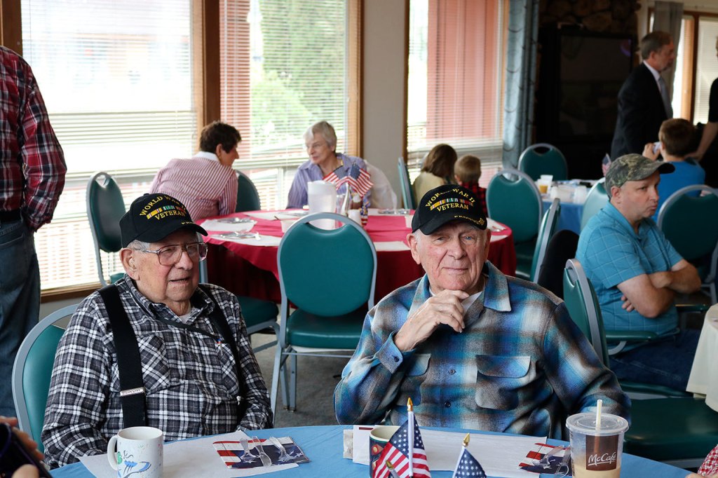 World War II veterans Walt Wyrsh and Bob Hamerly share their stories of the past at Mount Si Senior Center. (Evan Pappas/Staff Photo)