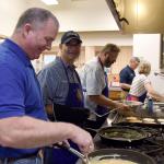 Member of the Duvall Rotary Club and Boy Scout Troop 411 worked together to put on a free breakfast honoring veterans at the Sno-Valley Senior Center Friday. Carol Ladwig/Staff Photo