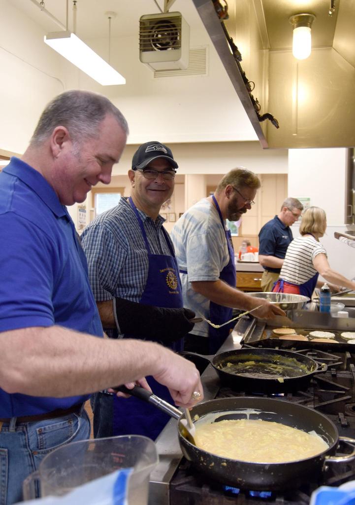 Member of the Duvall Rotary Club and Boy Scout Troop 411 worked together to put on a free breakfast honoring veterans at the Sno-Valley Senior Center Friday. Carol Ladwig/Staff Photo