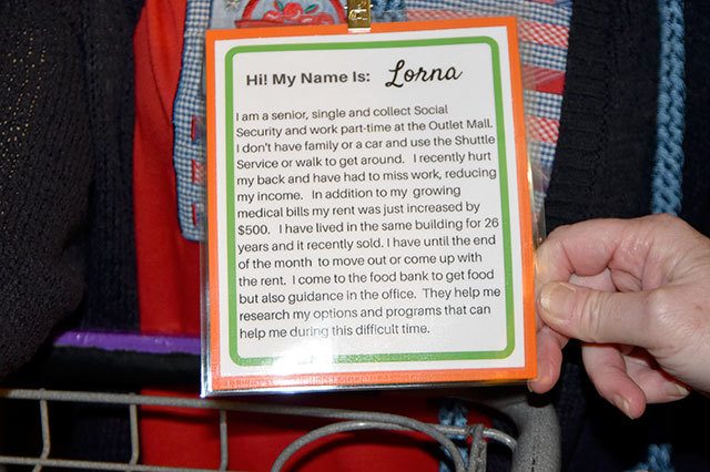 A card identifies each mannequin at the Snoqualmie Valley Food Bank open house. They served as visual representations of actual food bank clients.                                Carol Ladwig/Staff Photo