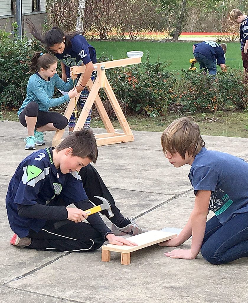 On a sunny day two weeks ago, Twin Falls Middle School sixth graders took their catapult projects outside for construction.                                Photo courtesy of Nancy Kinsella-Johnson