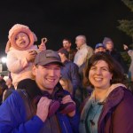 Mirko and Diana Mugglie, and daughter River, winking at the camera, enjoy their first time at a Snoqualmie tree-lighting event.