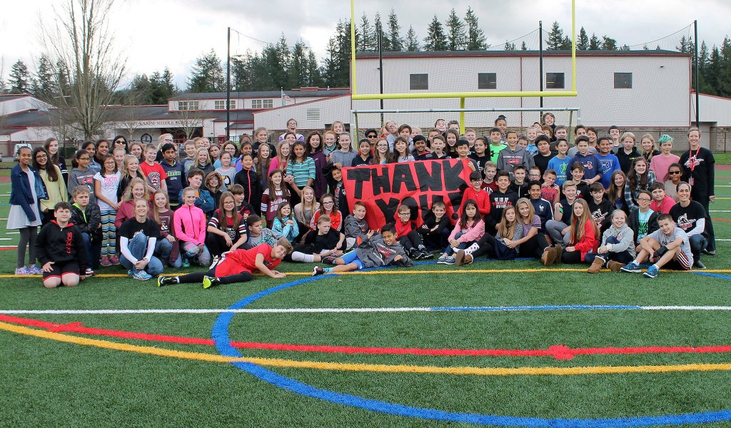 Chief Kanim Middle School students and staff show their appreciation for the school&rsquo;s bright new sports field.                                Courtesy Photo