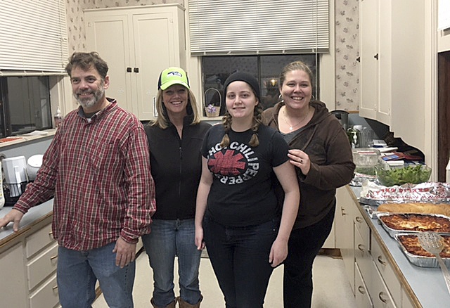 Snoqualmie Valley Winter Shelter staff gather for a meeting on Sunday, Nov. 27. From left, Andy Corbett, Jennifer Kirk, Gabby Burrell and Teresa McClain. (Courtesy Photo)