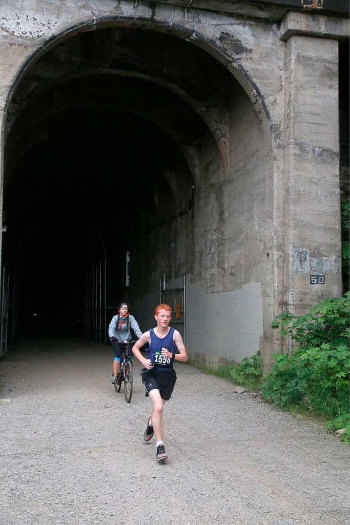 Ryan Moore running out of the Snoqualmie Tunnel during the beginning of the marathon. (Courtesy Photo)