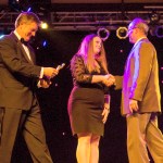 Courtesy Photo                                Rob Wotton presents the Business of the Year award to Snoqualmie Ridge IGA representatives.