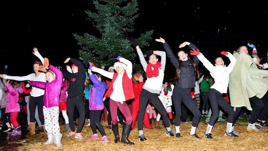 Dancers from Ignite Dance & Yoga perform at North Bend&rsquo;s holiday tree lighting event Saturday.                                Mary Miller Photo