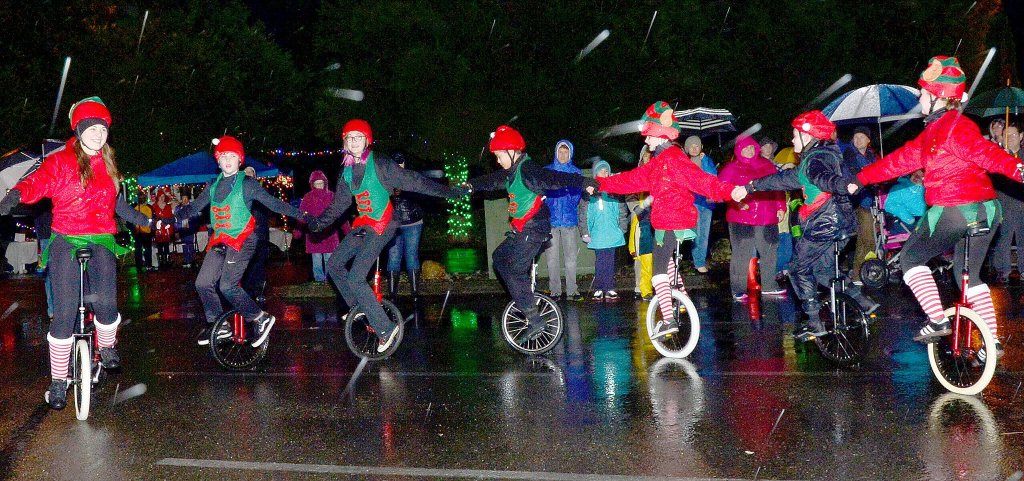 Through rain and wind, members of the Snoqualmie Valley Unicycle Club put on a show for the crowd.                                Mary Miller Photo