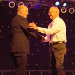 Chamber Board Member Dave Eiffert, right, of the Snoqualmie Brewery and Tap House presented Board President Andy Glandon with the Volunteer of the Year award during the gala.                                Courtesy Photo