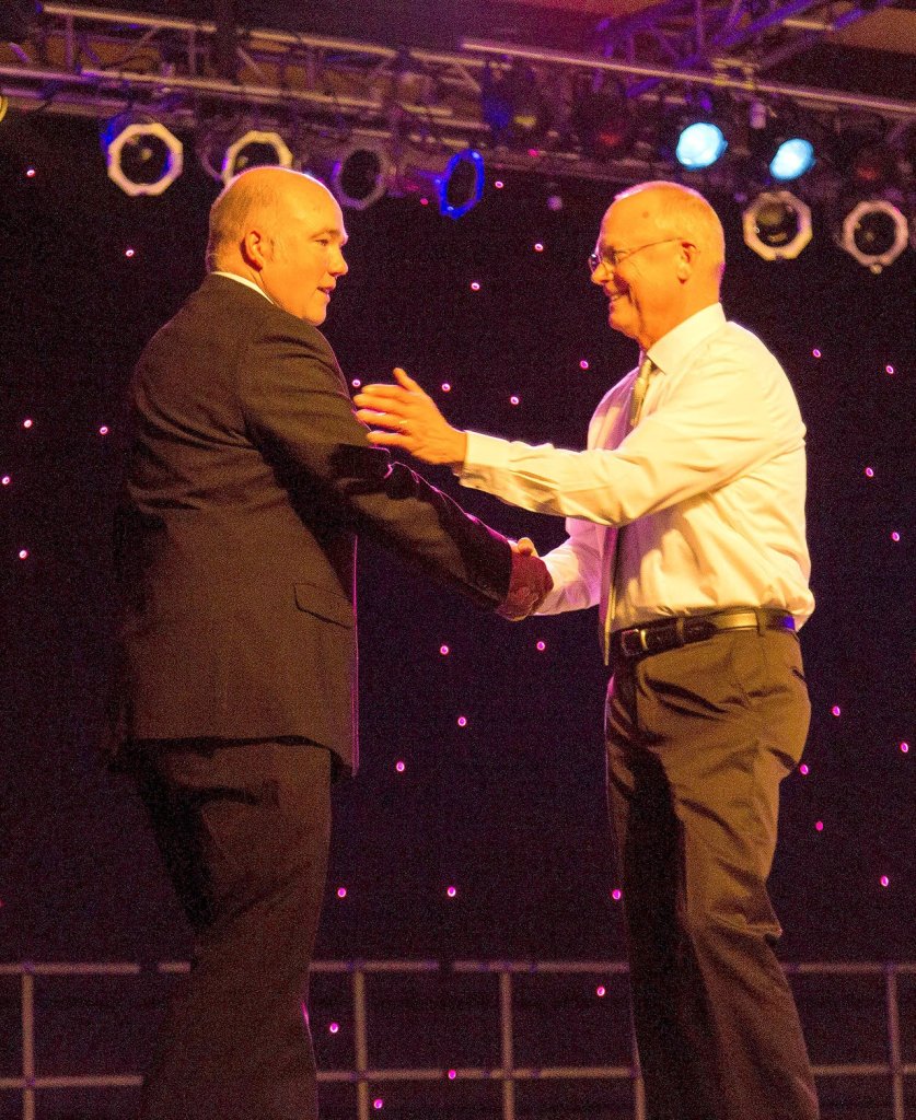 Chamber Board Member Dave Eiffert, right, of the Snoqualmie Brewery and Tap House presented Board President Andy Glandon with the Volunteer of the Year award during the gala.                                Courtesy Photo