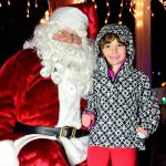 Santa posed for a photo with his young friend Easton. Mary Miller Photo