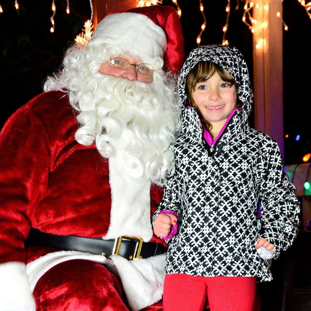 Santa posed for a photo with his young friend Easton. Mary Miller Photo