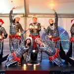 Veils of the Nile dancers pose for a fabulous finish of their performance Dec. 3.                                Mary Miller Photo