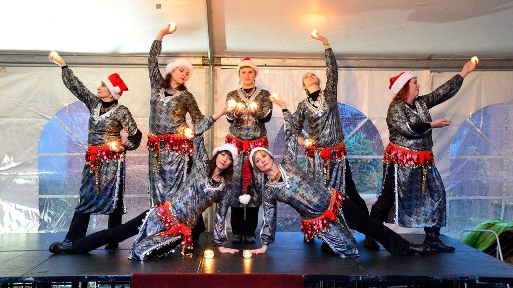 Veils of the Nile dancers pose for a fabulous finish of their performance Dec. 3.                                Mary Miller Photo