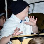 A young conga drummer thoroughly enjoyed his performance at the North Bend tree lighting Saturday.                                Mary Miller Photo