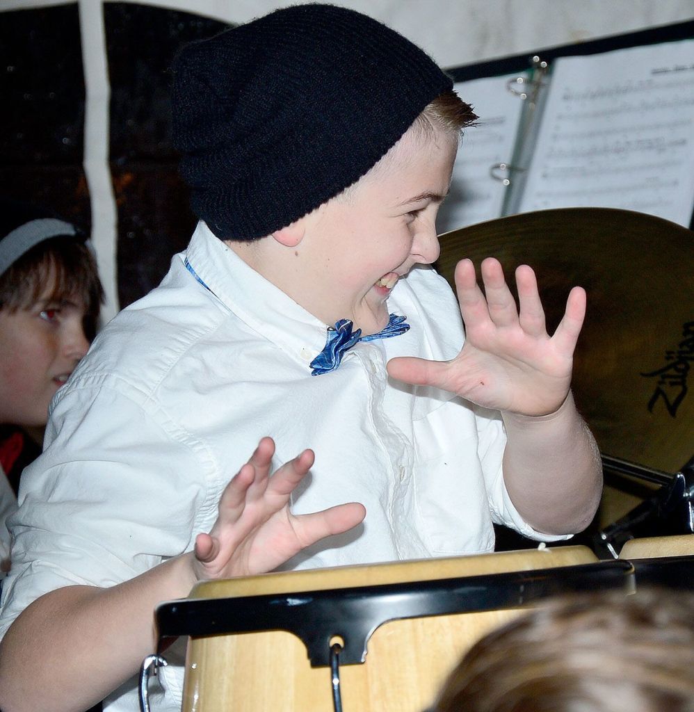 A young conga drummer thoroughly enjoyed his performance at the North Bend tree lighting Saturday.                                Mary Miller Photo