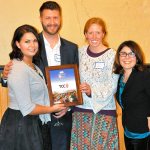 Tara DesJardin and Darrell Niemiec of TCC accept the Encompass Corporate Partner of the Year Award from Erin Davies and Nela Cumming of Encompass.                                Courtesy Photo